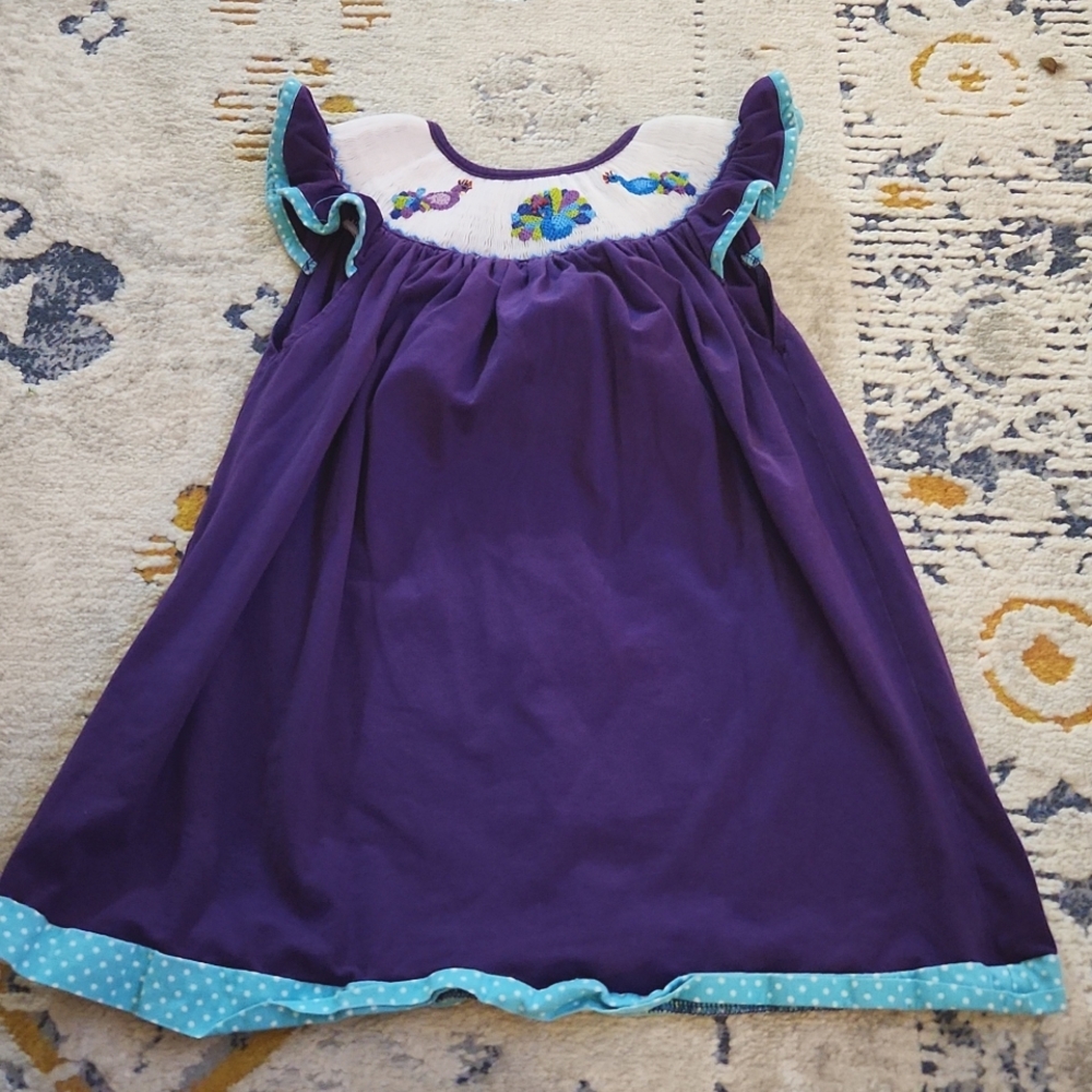 Smocked peacock dress